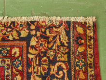 Large Persian Rug as Found