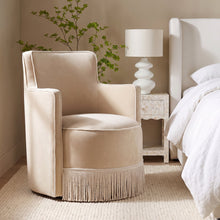 Passe Tasseled Velvet Swivel Accent Chair